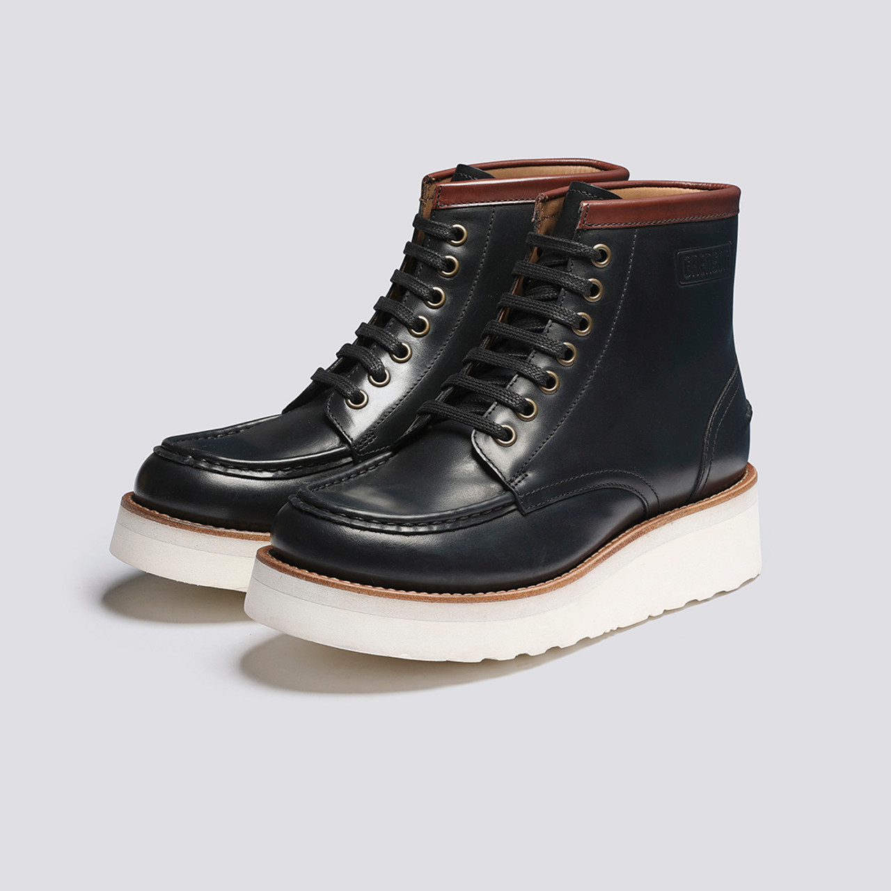 Mens black hot sale boots white sole