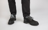Archie Tech | Mens Brogues in Black on Vibram Sole | Grenson - Lifestyle View