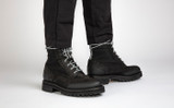 Fred Tech | Mens Brogue Boots in Black on Vibram Sole | Grenson - Lifestyle View