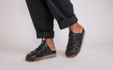 Sneaker 75 | Mens Mules in Black Burnished Nubuck | Grenson - Lifestyle View