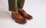 Dylan | Mens Brogues in Tan Handpainted Leather | Grenson - Lifestyle View