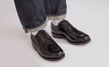 Sid | Mens Brogues in Black Hi Shine Leather | Grenson - Lifestyle View